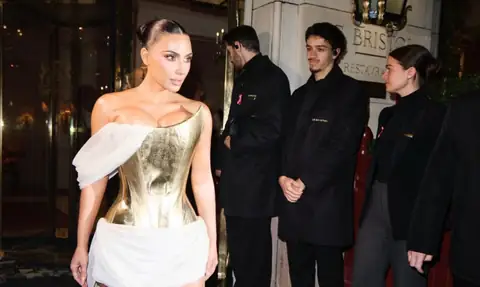 Kim Kardashian Celebrates 45th Birthday in Rare Alexander McQueen for Givenchy Corset Gown